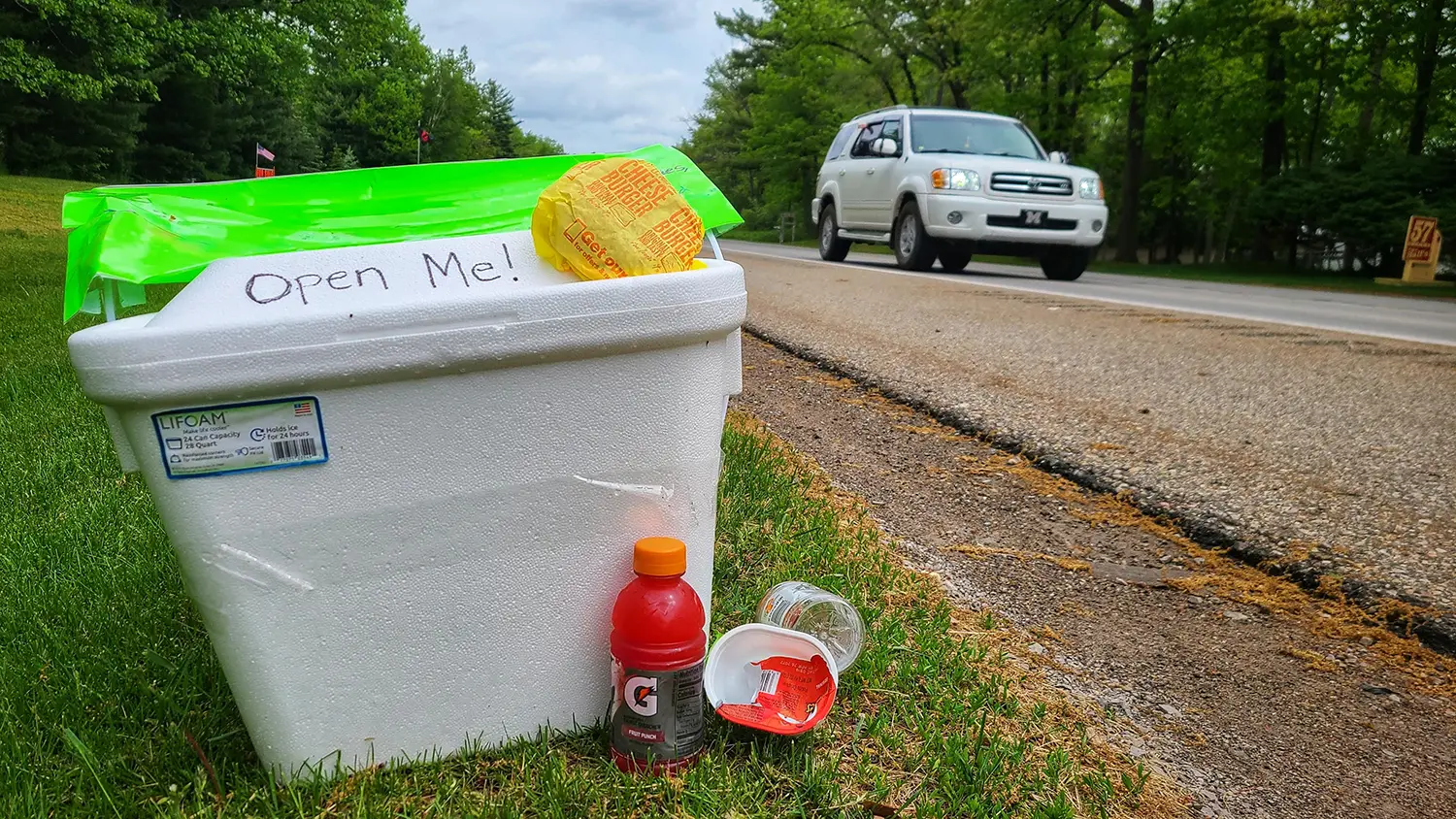 A cooler placed on the course by a Road Angel